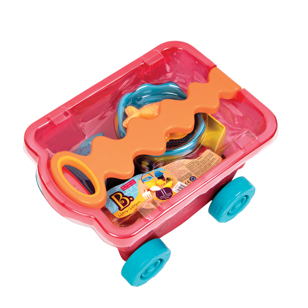 Beach toys and translucent red wagon