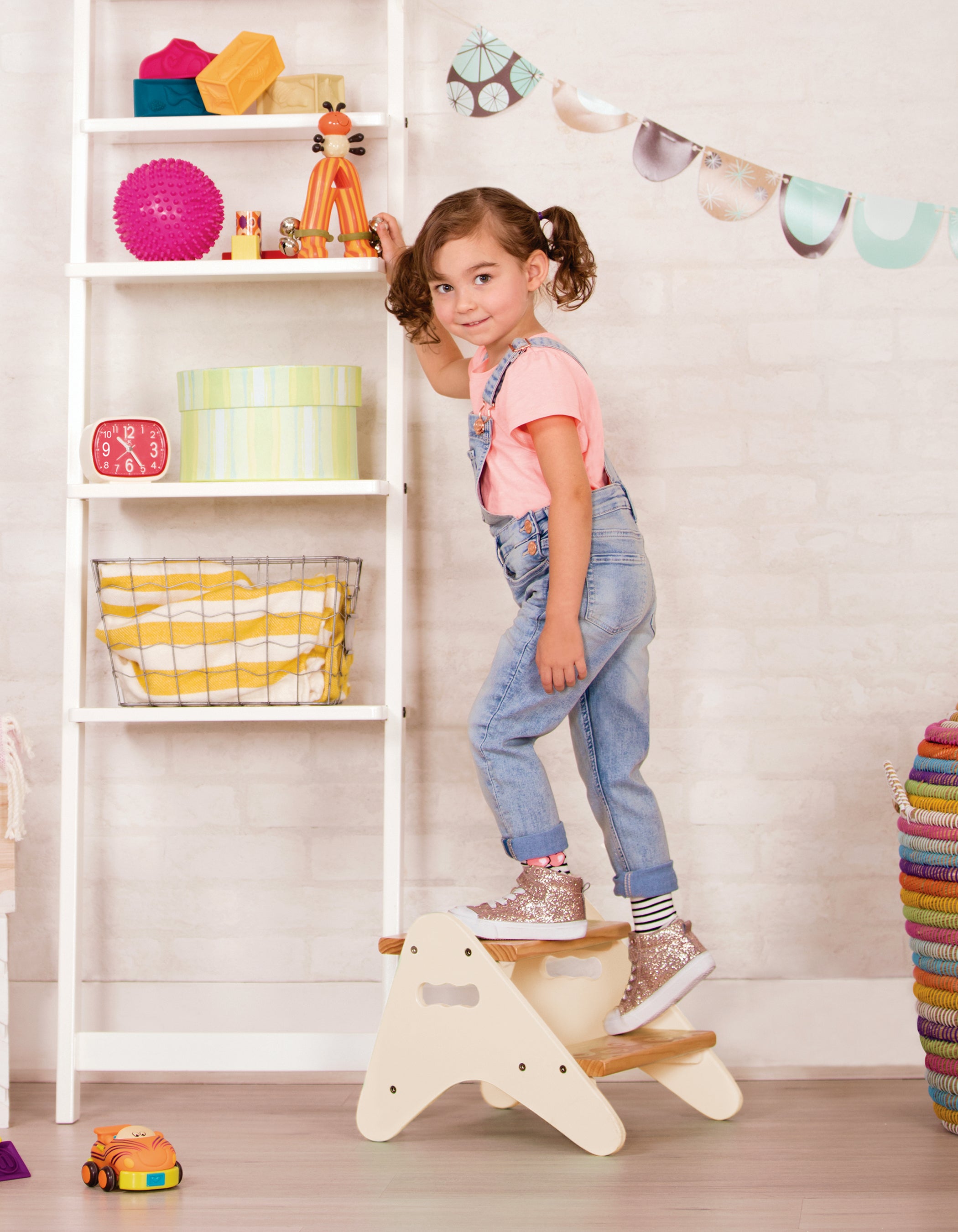 Kid using ivory step stool.