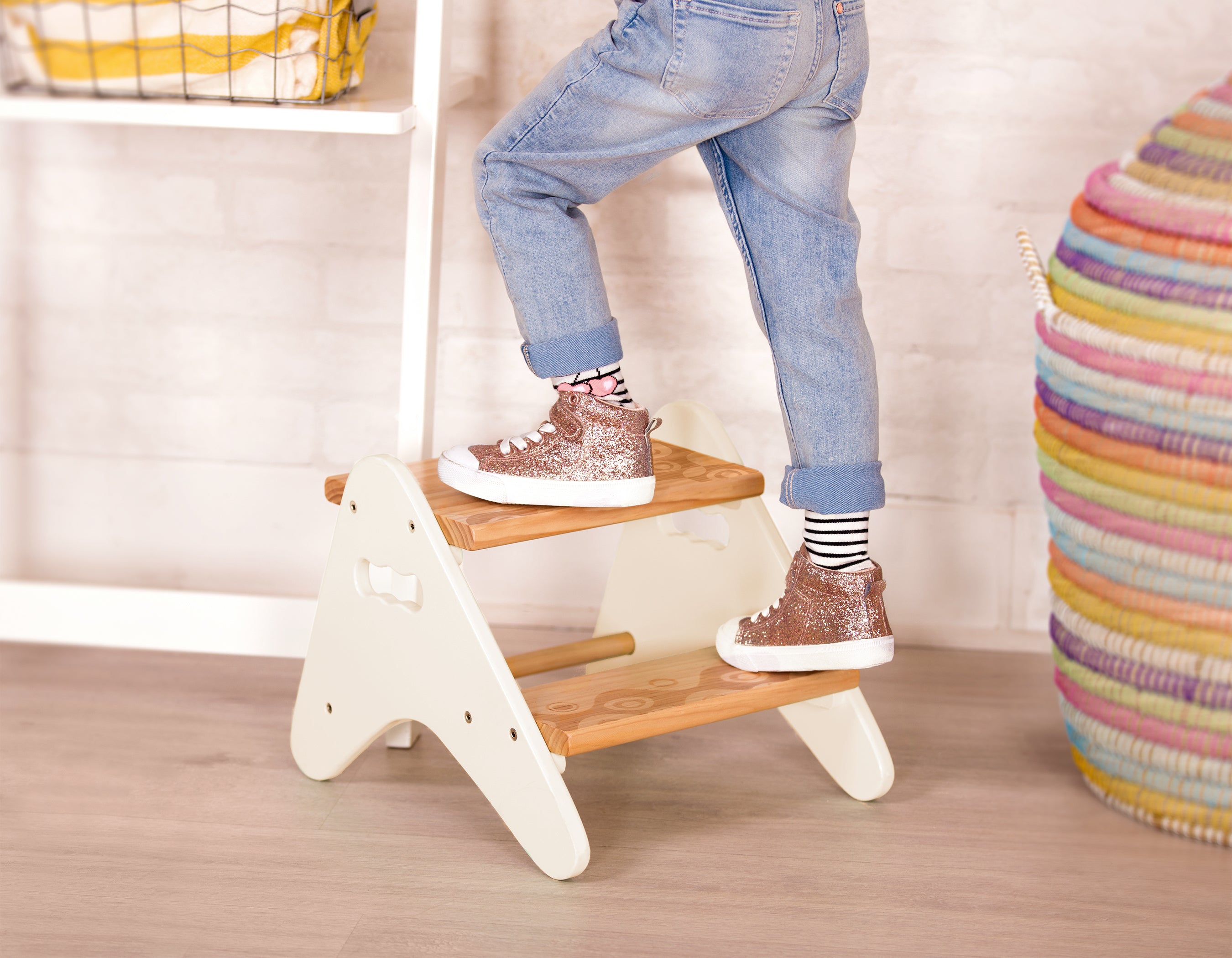 Kid using ivory step stool.