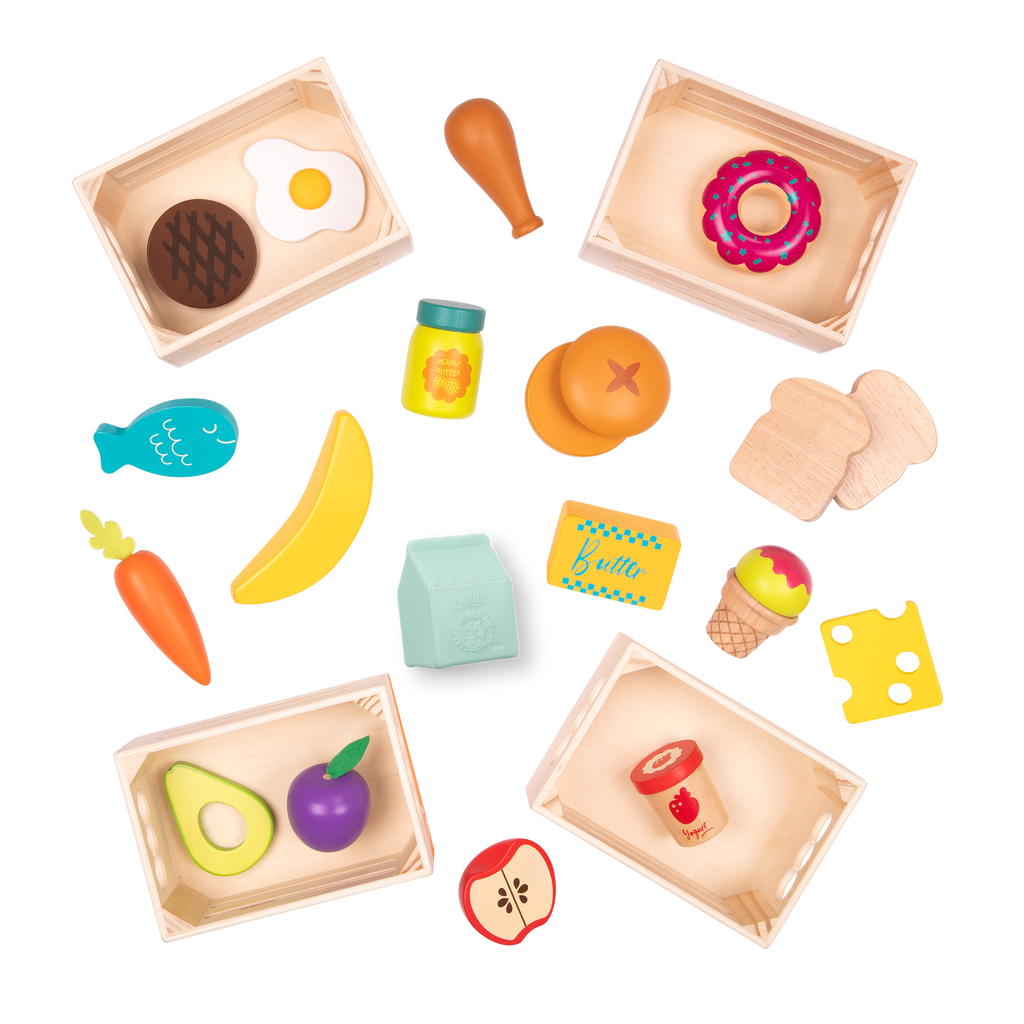 Wooden play food in crates.