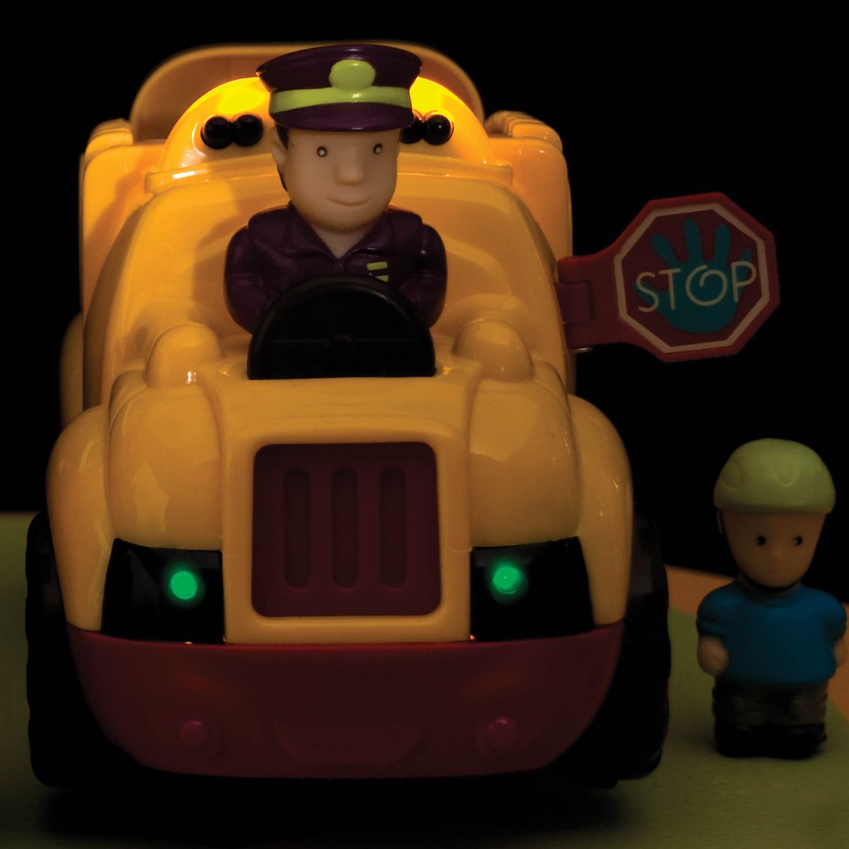 Toy school bus with driver and passengers