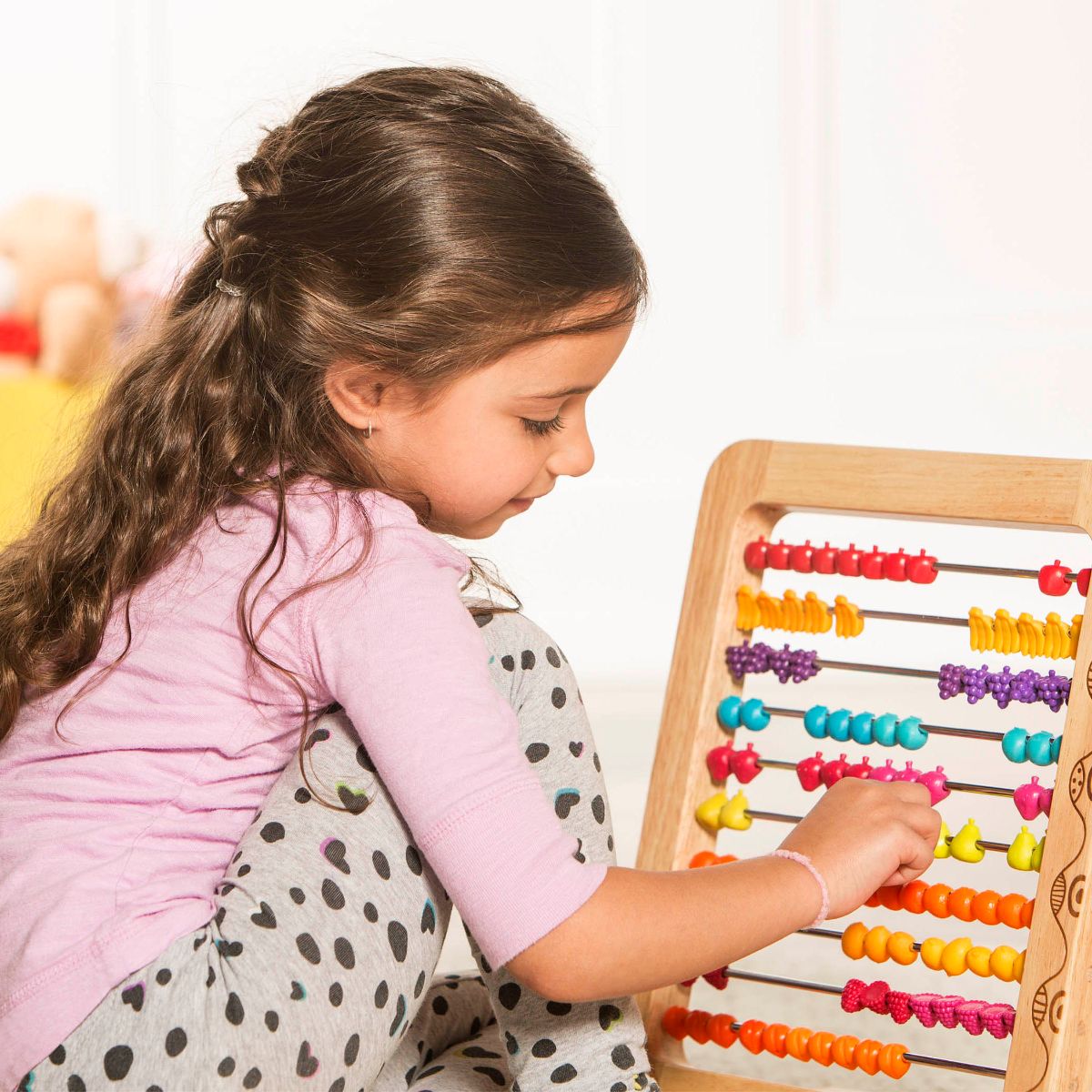 Fruit-themed wooden abacus.