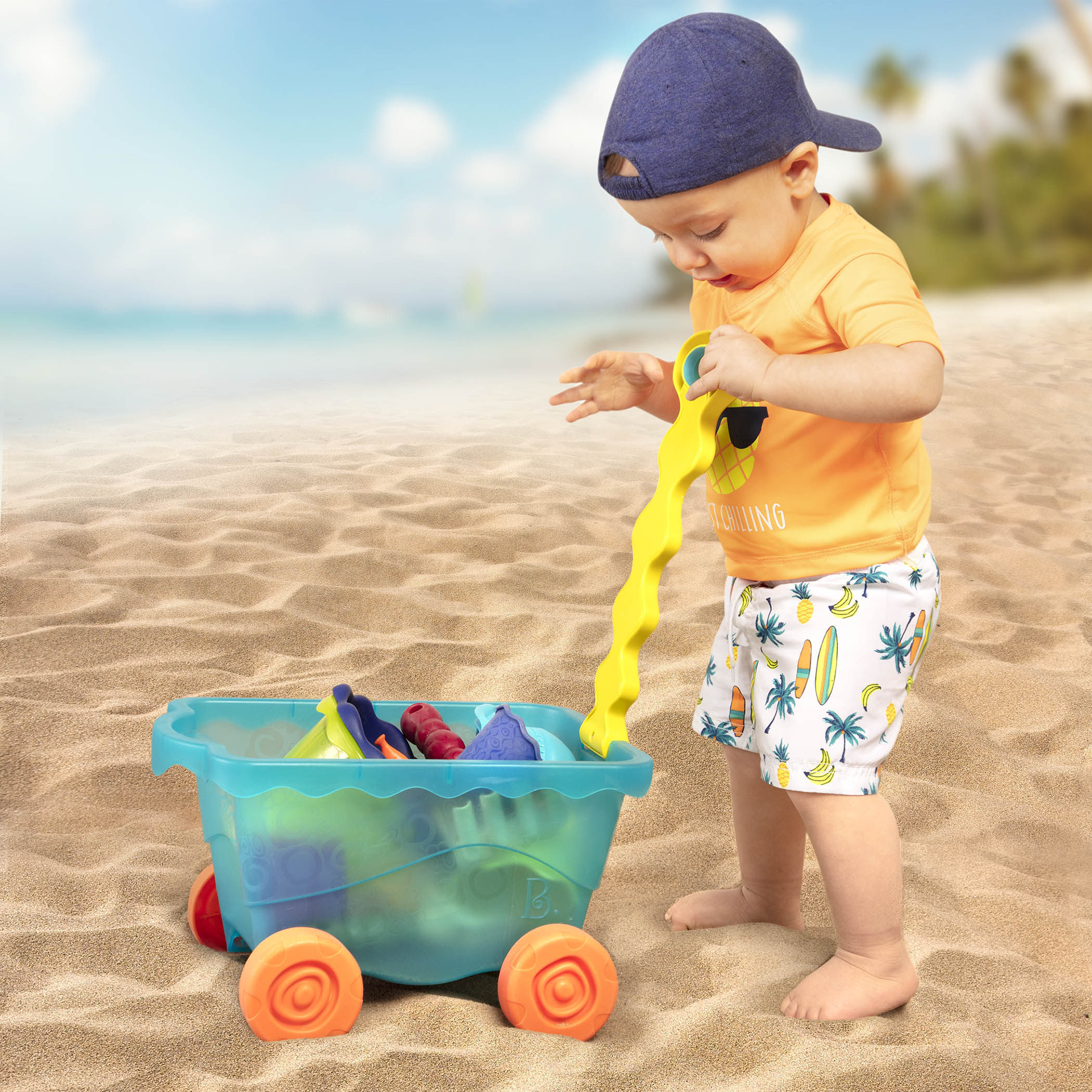 Beach toys and translucent blue wagon